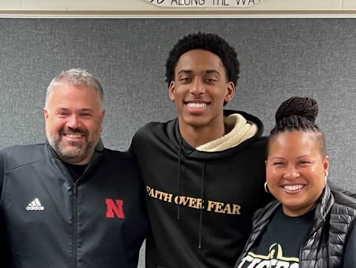 Dawson Merritt with his mother and Nebraska head coach Matt Rhule